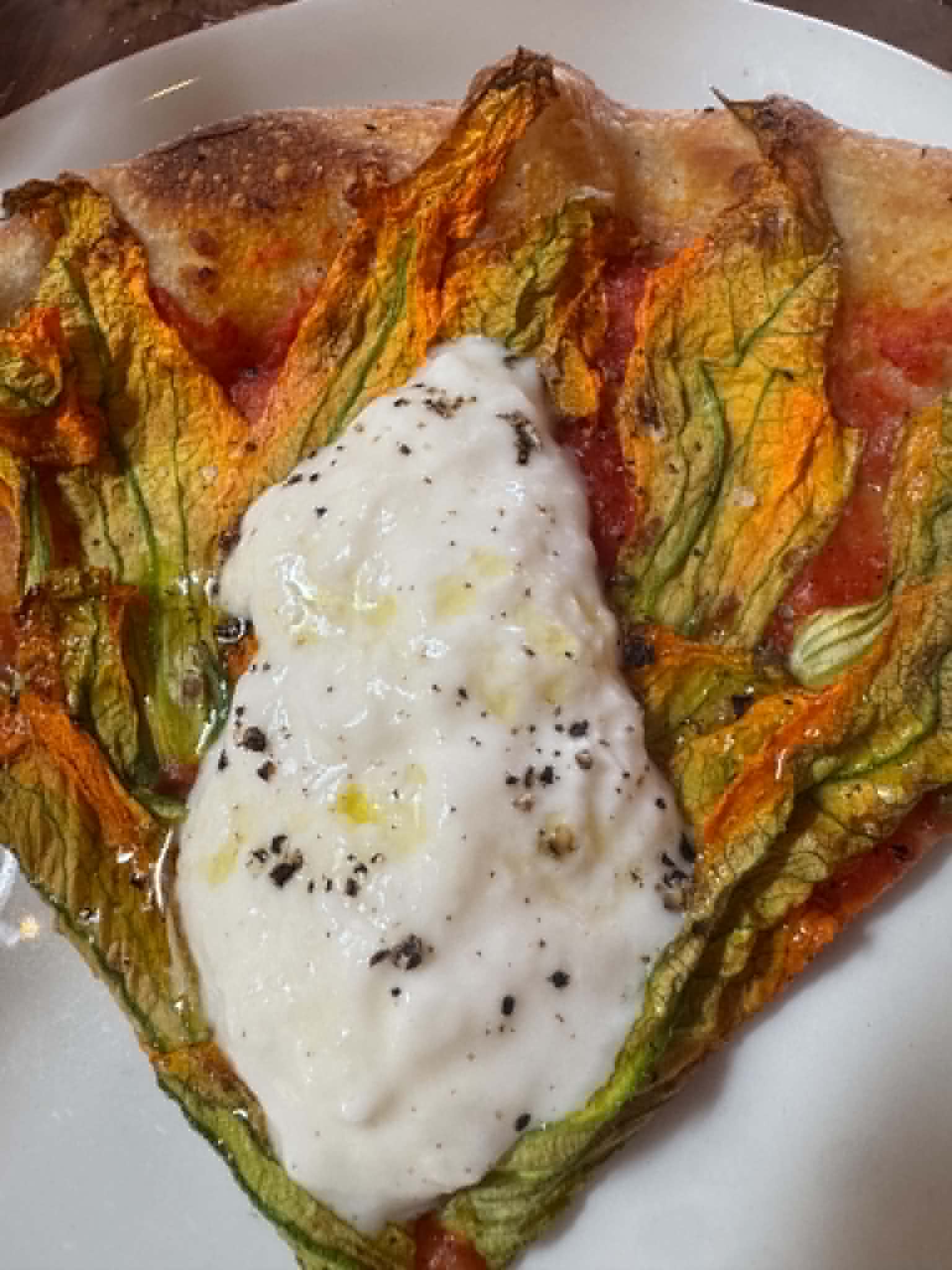 Squash blossom pizza with burrata at Pizzeria Mozza in Los Angeles
